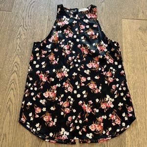 A.L.C Anise black silk blouse with a floral print. Racerback, slit and snap back